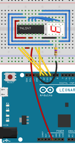 L’utilisation du décodeur BCD pour l’afficheur sept segments ; les entrées sont en jaunes, les sorties en bleu, +5V en rouge et la masse en noir (source)